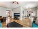 Open-concept living room featuring stylish furniture, hardwood floors, and natural light at 4033 Bliss Canyon Ct, Las Vegas, NV 89129