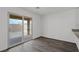 Bright, neutral living room with a sliding glass door leading to the backyard patio at 4224 Golden Sol St, North Las Vegas, NV 89032