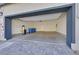 View of the spacious garage with water filter, epoxy floors and ample room for storage at 527 Clearsable Ave, Henderson, NV 89044