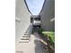 Stairway between buildings showing a walkway to units, enhancing accessibility and curb appeal at 555 E Silverado Ranch Blvd # 1123, Las Vegas, NV 89183