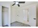 Neutral bedroom features a ceiling fan, closet and light gray carpet at 5720 Ritter Ln, Las Vegas, NV 89118