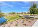 Beautiful community park with walking paths and serene pond in a Gathering friendly area at 625 Honesty Ct, Henderson, NV 89011