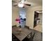 Open floor plan: dining area views living room and kitchen with washer/dryer at 669 Oakmont Ave # 3709, Las Vegas, NV 89109
