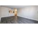 Spacious living room with sleek flooring and a seamless transition into the open-concept kitchen, perfect for modern living at 669 Oakmont Ave # 3709, Las Vegas, NV 89109