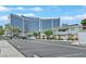 Exterior view of a community with a large building behind parking lot at 669 Oakmont Ave # 3709, Las Vegas, NV 89109
