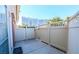 Beautifully fenced patio with concrete flooring and views of the city's building, ideal for entertaining or relaxing at 669 Oakmont Ave # 3709, Las Vegas, NV 89109