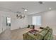 Spacious bonus room features bright natural light, neutral carpet and ample space at 6747 Marjoram St, Las Vegas, NV 89166