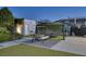 Recreational backyard features a basketball court, trampoline and swing set at 675 Benedict Dr, Las Vegas, NV 89110