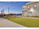 Large backyard boasts of basketball court, well-maintained artificial grass, and pool at 675 Benedict Dr, Las Vegas, NV 89110