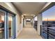Exterior balcony with metal railings and views of city skyline at sunset at 675 Benedict Dr, Las Vegas, NV 89110