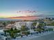 Stunning aerial view showcasing the modern home with backyard basketball court, and pool at 675 Benedict Dr, Las Vegas, NV 89110