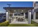 Beautiful outdoor kitchen area with a grill, dining space, and modern design at 675 Benedict Dr, Las Vegas, NV 89110