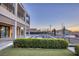Inviting backyard features a sparkling in-ground pool and a modern two-story home at 675 Benedict Dr, Las Vegas, NV 89110