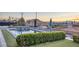 Spacious backyard with artificial turf, and an in-ground pool and spa at 675 Benedict Dr, Las Vegas, NV 89110