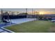 Private sports court with basketball hoop and space for outdoor activities at 675 Benedict Dr, Las Vegas, NV 89110