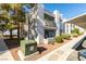 Charming exterior with a private balcony, landscaped grounds, and convenient covered parking at 6800 E Lake Mead Blvd # 1034, Las Vegas, NV 89156