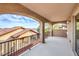 Enjoy the outdoor view from this covered balcony with stylish railings and arched openings at 6856 Pipil St, Las Vegas, NV 89166