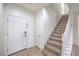 Welcoming entryway with a staircase leading to the upper level at 6856 Pipil St, Las Vegas, NV 89166