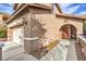 Exterior view of home featuring stucco and a covered front porch at 6856 Pipil St, Las Vegas, NV 89166