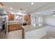 Spacious kitchen with granite countertops, stainless steel appliances, and large center island at 6856 Pipil St, Las Vegas, NV 89166