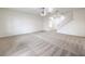 Expansive living room with plush carpeting and abundant natural light at 6856 Pipil St, Las Vegas, NV 89166