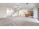 Open-concept living room and kitchen provides ample space for gathering and entertaining at 6856 Pipil St, Las Vegas, NV 89166