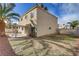 Large backyard with covered patio and desert landscaping at 7973 Macklin St, Las Vegas, NV 89129