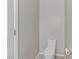 Bathroom featuring a toilet, tiled floor, and neutral wall color at 7973 Macklin St, Las Vegas, NV 89129