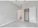 Bedroom with carpet, ceiling fan, and closet with sliding doors at 7973 Macklin St, Las Vegas, NV 89129