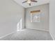 Bedroom features a ceiling fan and a window with a wood blind at 7973 Macklin St, Las Vegas, NV 89129