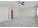 Bedroom featuring neutral carpet and a ceiling fan at 7973 Macklin St, Las Vegas, NV 89129