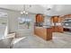 Eat-in kitchen with tile floors and stainless steel appliances at 7973 Macklin St, Las Vegas, NV 89129
