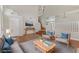 Bright living room features two story ceilings, hardwood floors and neutral tones at 7973 Macklin St, Las Vegas, NV 89129