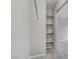 Walk-in closet with built-in shelving and metal rod at 7973 Macklin St, Las Vegas, NV 89129