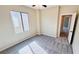 Sunlit bedroom featuring plush carpets, and a doorway leading to another room at 8216 Chimney Bluffs St, North Las Vegas, NV 89085