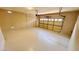 Spacious two car garage with clean epoxy flooring and insulated door at 8216 Chimney Bluffs St, North Las Vegas, NV 89085
