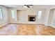 Spacious living room featuring tile flooring, a fireplace and neutral colored walls at 8216 Chimney Bluffs St, North Las Vegas, NV 89085