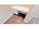 Carpeted office nook featuring a white built-in desk with storage drawers at 8216 Chimney Bluffs St, North Las Vegas, NV 89085