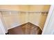 Unfurnished walk-in closet featuring carpeted floor and shelving at 8216 Chimney Bluffs St, North Las Vegas, NV 89085