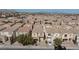 Bird's eye view of homes in a neighborhood with green landscaping at 9748 Villa Lorena Ave, Las Vegas, NV 89147