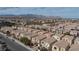 An overhead view of a residential neighborhood with mountain views in the background at 9748 Villa Lorena Ave, Las Vegas, NV 89147