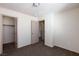 Bedroom with neutral carpet, ceiling light, closet and ensuite bathroom at 9748 Villa Lorena Ave, Las Vegas, NV 89147