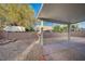 A backyard featuring a covered patio, providing a shaded area for leisure and entertaining guests at , Las Vegas, NV 89106