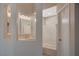 A view to the bathroom featuring double sinks, ample lighting, and a shower-tub combo for ultimate relaxation at , Las Vegas, NV 89106