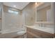 Bathroom featuring shower-tub combo, sink, and large mirror at , Las Vegas, NV 89106