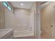 Bathroom featuring a tub-shower, single sink vanity, and a window that brings in natural light at , Las Vegas, NV 89106