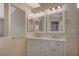 The bathroom is equipped with double sinks, a vanity, decorative lighting, and ample counter space at , Las Vegas, NV 89106