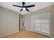 Bedroom with ceiling fan, closet, light paint, and tile flooring at , Las Vegas, NV 89106