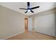 Bedroom with ceiling fan, closet, light paint, and tile flooring at , Las Vegas, NV 89106