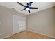 Bedroom featuring a ceiling fan and large closet with mirrored doors at , Las Vegas, NV 89106